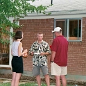 USA ID Boise 7011WestAshland 2003AUG02 Party FitzysPool 007  Alison and Justin having a chinwag with Mike. : 2003, 7011 West Ashland, Americas, August, Boise, Date, Events, Fitzy's Pool Party, Idaho, Month, North America, Parties, Places, USA, Year